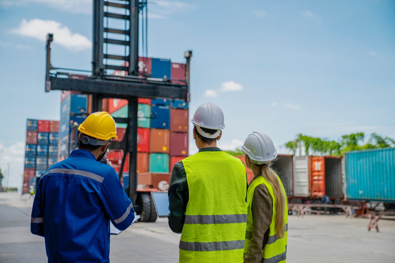 foreman are discussing for stack container at cargo site logistics service transportation. foreman are discussing for stack container at cargo site logistics service transportation.