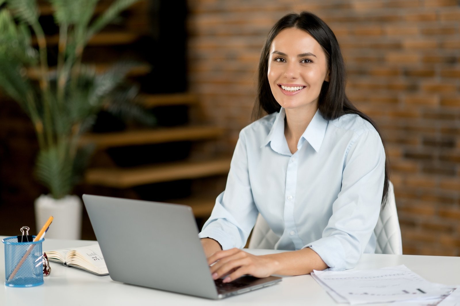 Portrait Caucasian female stock trader in office. Successful smart business woman, top manager or