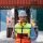 Portrait of Foreman checking inventory or task details at Container cargo harbor.